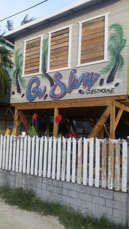 Go Slow Guesthouse Caye Caulker Esterno foto